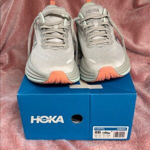 Hoka Bondi 8 size 8B women’s shoe. 
Mint, corral and gray. Worn 1 time.